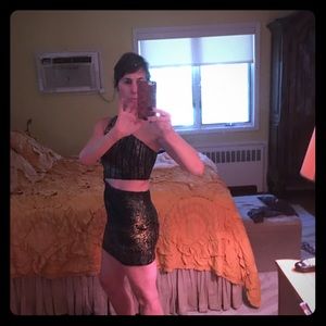 Issue New York cut out one shoulder gold/blk dress